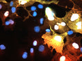 Immunofluoresence of FLAG-tagged AIF1 transfected COS cells showing AIF1 staining in red (Cat. 91-AIF1, 1:50) and FLAG staining in green causing positive transfected cells to appear yellow. DNA is stained blue with DAPI.